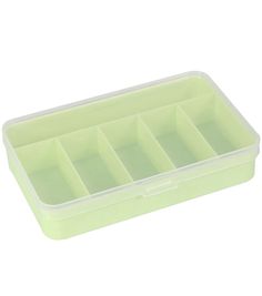 a plastic container filled with compartments on top of a white surface