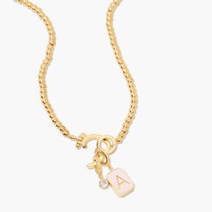 This Molly Enamel Charm Necklace is the perfect necklace to create your charm story! It comes with a blush initial enamel charm and a sparkly cz crystal charm, and the hinge closure. Available in 14k gold plated brass Avery Necklace: Size: 18" bead necklace, hinge closure measures 1/2", 4mm beads Molly Initial Enamel Charm: 3/8"x1/4" enamel filled charm, hinge closure Leia Charm: 3mm round cz bezel, hinge closure Protected with an anti-tarnish barrier With customization this item is FINAL SALE S Nails Jewelry, Tennis Jewelry, Upscale Fashion, Modern Jewellery Design, Luxe Jewelry, Jewelry Tattoo, Nail Jewelry, Gold Charm Necklace