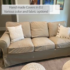 a living room with couches and rugs on the floor