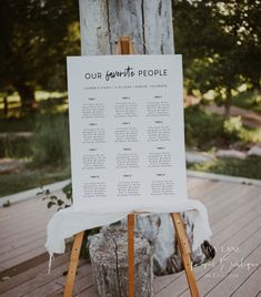 an easel with a sign on it that says our favorite people and the date