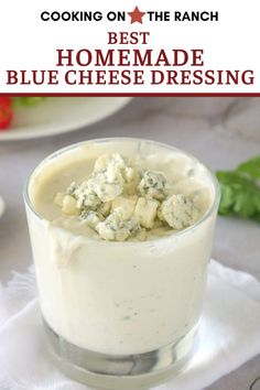 the best homemade blue cheese dressing recipe is in a small glass dish on a white napkin