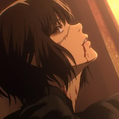 an anime character with black hair and blood on his face, staring at something in the distance