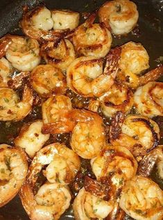 cooked shrimp being cooked in a skillet