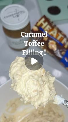 a spoon full of food on top of a white plate with the words caramel toffe filling