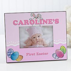 a baby's first easter frame next to a teddy bear