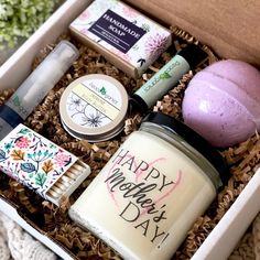 the happy mother's day gift box is filled with personal care items