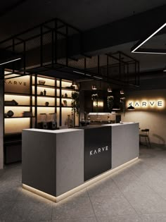 the interior of a kave store with lights on and shelves full of shoes in it