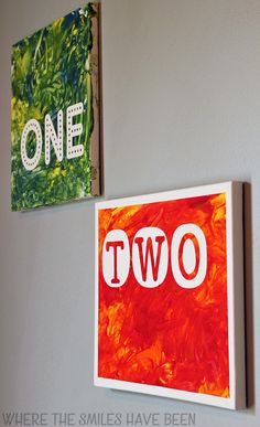 two paintings are hanging on the wall next to each other, one is red and green