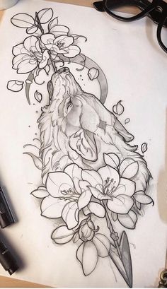 a pencil drawing of a lion with flowers on it's face and some scissors next to it