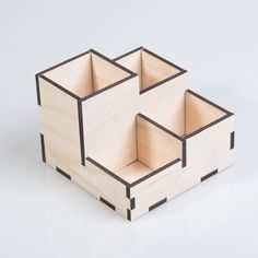 two wooden boxes sitting on top of each other