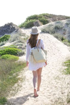 Our Woven Sisal and Leather Tote is chic and casual perfection. Made from sturdy woven cream colored sisal giving it structure with timeless leather straps. This roomy tote is the perfect size for your daytime outings. Roomy enough for a lightweight beach towel and a good book or for toting your laptop along with your daily necessities. Handwoven in Kenya with cream sisal fiber and leather. Eco-friendly Woven Leather Straw Bag For Travel, Leather-trimmed Straw Bag For Everyday Use, Beige Woven Leather Rattan Bag, Eco-friendly Straw Beach Bag With Woven Leather, Eco-friendly Beach Bag With Woven Leather And Natural Fiber, Daily Necessities, Beach Towel, Cream Color, Panama Hat