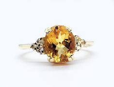 Don't miss this opportunity to own this beautiful gemstone ring crafted in 14k gold filled => Gemstone Type - Citrine, Clear Quartz => Gemstone Cut - Faceted => Gemstone Size - 8*10 mm, 2 mm => Total Number of Gemstones - 7 => Metal Type - 14k Gold Filled (Tarnish Resistant And Nickel Free) - also available in 925 sterling silver * Please contact me for pricing on a sizes larger than 11 * ~ Feel free to ask me about custom made designs. ❏ Replacements and custom orders : ✪ 925 ste Oval Yellow Diamond Promise Ring, Yellow Oval Promise Ring, Oval Yellow Topaz Promise Ring, Yellow Oval Topaz Promise Ring, Gold Oval Rings With Gemstone Accents, Oval Gold Rings With Gemstone Accents, Yellow Oval Ring For Wedding, Yellow Oval Birthstone Promise Ring, Oval Rings With Gemstone Accents For Anniversary