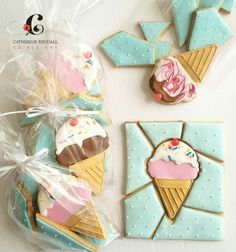 decorated cookies in the shape of ice cream and cupcakes