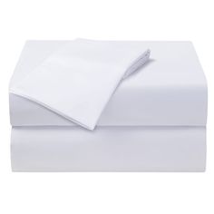 the white sheets are folded on top of each other