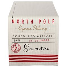 the north pole express delivery table runner is white with red and black stripes on it