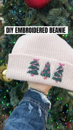 🎀🎄 DIY Bow Christmas Beanie #handemboidery #diyembroidery #embroideredbeanie #christmascrafts How To Embroider On A Hat, Hand Embroidery Beanie, Embroidered Beanie Diy, Diy Bow Christmas, Beanie Embroidery Ideas, Embroider Beanie, I Need A Hobby, Christmas Beanie, Embroidered Beanie