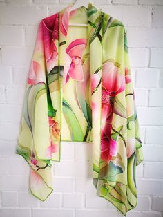 Hand painted chic extra large silk scarf/shawl. Big Blush -Red -Magenta pink Orchid Blossoms. Various shades of Green Leaves. Calm Light Green background. This scarf is painted on Crepe de Chine silk. This silk has slightly crinkled texture with a gentle, graceful drape and delicate touch. This silk is one of the most luxurious fabrics. PHOTO Scarf size is 80x35 size 80*35 inches (205*90 cm)-Long and wide scarf. This big size shawl is amazing for special occasion when it drapes freely around the Red Orchids, Large Silk Scarf, Silk Chiffon Scarves, Yellow Scarf, Floral Silk Scarf, Pink Orchids, Painted Silk, Silk Shawl, Summer Scarves