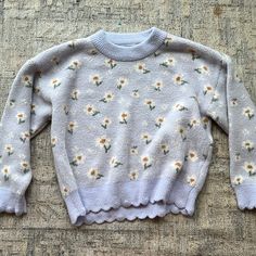 Fluffy Purple Zara Sweater With Daisies On It. Never Worn And Still Has Tags. Very Soft And Warm!! Kids Size But Fits A Women’s Xs Cute Long Sleeve Soft Knit Tops, Playful Knitted Crew Neck Top, Cute Yellow Long Sleeve Sweater, Playful Knitted Tops For Spring, Spring Yellow Soft Knit Tops, Cute Yellow Sweater For Fall, Cute Yellow Fall Sweater, Cozy Yellow Tops For Spring, Cozy Yellow Spring Top