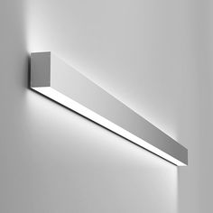 a white light that is on the side of a wall