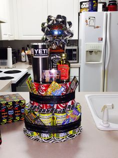 a cake made out of candy and candies sits on a kitchen counter