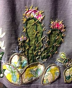 a close up of a cactus on a shirt