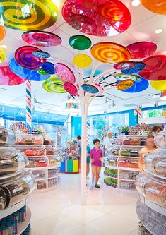 the inside of a store filled with lots of colorful items