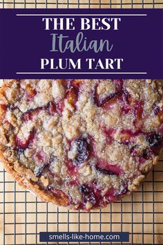 the best italian plum tart pie on a cooling rack with text overlay that reads, the best italian plum tart