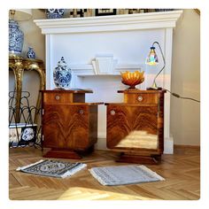 two pieces of furniture sitting on top of a hard wood floor