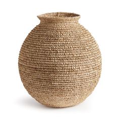 a large woven vase is shown on a white background and it's made out of straw