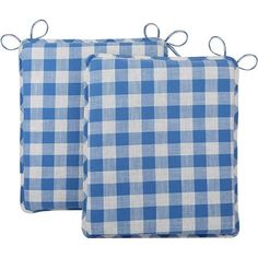 two blue and white checkered pillows with ties