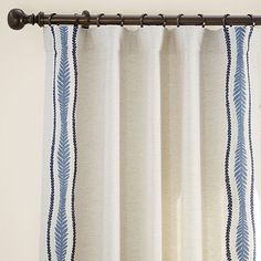 a curtain with blue and white designs on it