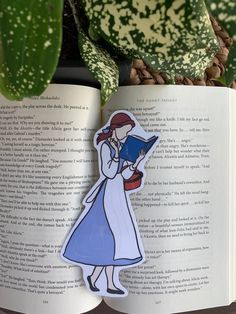 a bookmark with an image of a woman reading a book on top of it