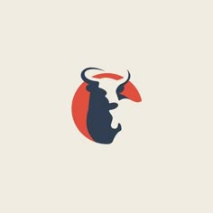 a bull's head is shown in the middle of a red and blue circle