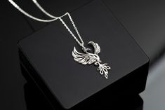 Phoenix Rising Necklace Sterling Silver, Phoenix Jewelry, Firebird Necklace, Bird Jewelry, Mythology Necklace, Inspirational Gift For Her TO OUR VALUED CUSTOMERS ! Please take a look at our special catalog that we have prepared for you ! ▶ https://www.etsy.com/shop/MarryMinimalist ✔️ All products in our unique store are personalized. ( You can find our font list in the images ) D E T A I L S ✔️A lifetime silver CLEANING CLOTH is given as a GIFT along with the 925 Sterling Silver Necklace! ✔️ * Made to Order. * Handmade with Sterling %100 925K Sterling Solid Silver. * Choice of Gold Color: Gold, Rose Gold, Silver * Length: 14", 16", 18", 20", 22" * Ready to Ship in 1-3 Business Days * Free returns within 14 days from the order date. ✔️ 24/7 Friendly Customer Service, contact us for any ques Phoenix Jewelry, Phoenix Necklace, Phoenix Pendant, Phoenix Rising, Bird Jewelry, Firebird, Necklace Sterling Silver, Pretty Jewellery, Love Gifts