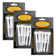 three white plastic toothbrushes in packaging on a white background with black and yellow labels