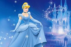 the princess in her blue dress is standing near a castle