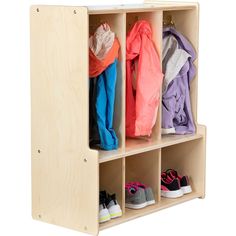 a wooden cubby with several coats and shoes on it