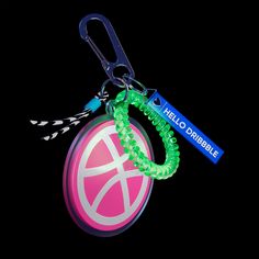 a key chain with a basketball on it and a lanyard clip attached to it