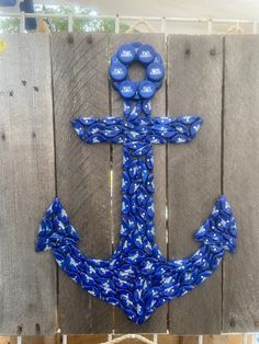 an anchor made out of plastic bottles and rope