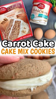 someone holding up a cake mix cookie in front of eggs and carrots on the table