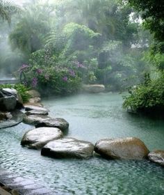 a river that has some rocks in it