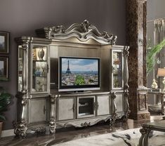 an ornate silver entertainment center in a living room