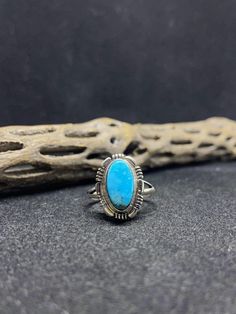 Handmade Native American Navajo sleeping beauty turquoise Sterling Silver Ring Size 8 signed & stamped. Conditions are new with tags.  really good stone with a clean cut. No voids. The stone is expertly carved by hand and placed in the silver. There is 1 hand cut stone soldered into a silver bezel with gorgeous silverwork around the stone.  There are two pieces of silver soldered together as the band. nice comfortable band.  The ring is approximately 1/2 inch wide & 3/4 inch long.  Weight: 4.8 grams.  Great weight !  Thank you for supporting our Native Americans Thank you for visiting our store Condition is "New with tags". Shipped with USPS First Class. B Class B, Sleeping Beauty Turquoise, Clean Cut, Sterling Silver Ring, Statement Rings, Native American, Nativity