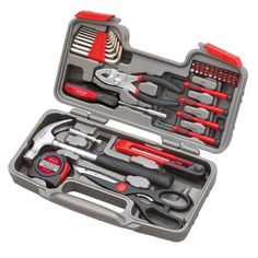 an open tool box with tools in it