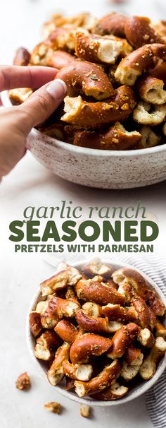 two bowls filled with roasted nuts on top of a white tablecloth and the words garlic crunch seasoned pretzels with parmesan