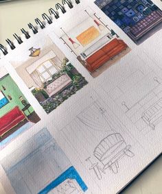 an open notebook with drawings of different rooms and furniture on it's cover, sitting on a desk next to a computer keyboard