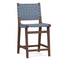 a brown and white bar stool with woven seat padding on the armrests