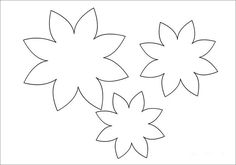 three paper flowers are shown on a white background