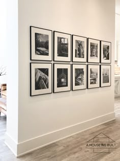 black and white photographs hanging on the wall