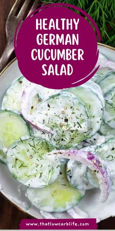 a white plate topped with cucumber salad